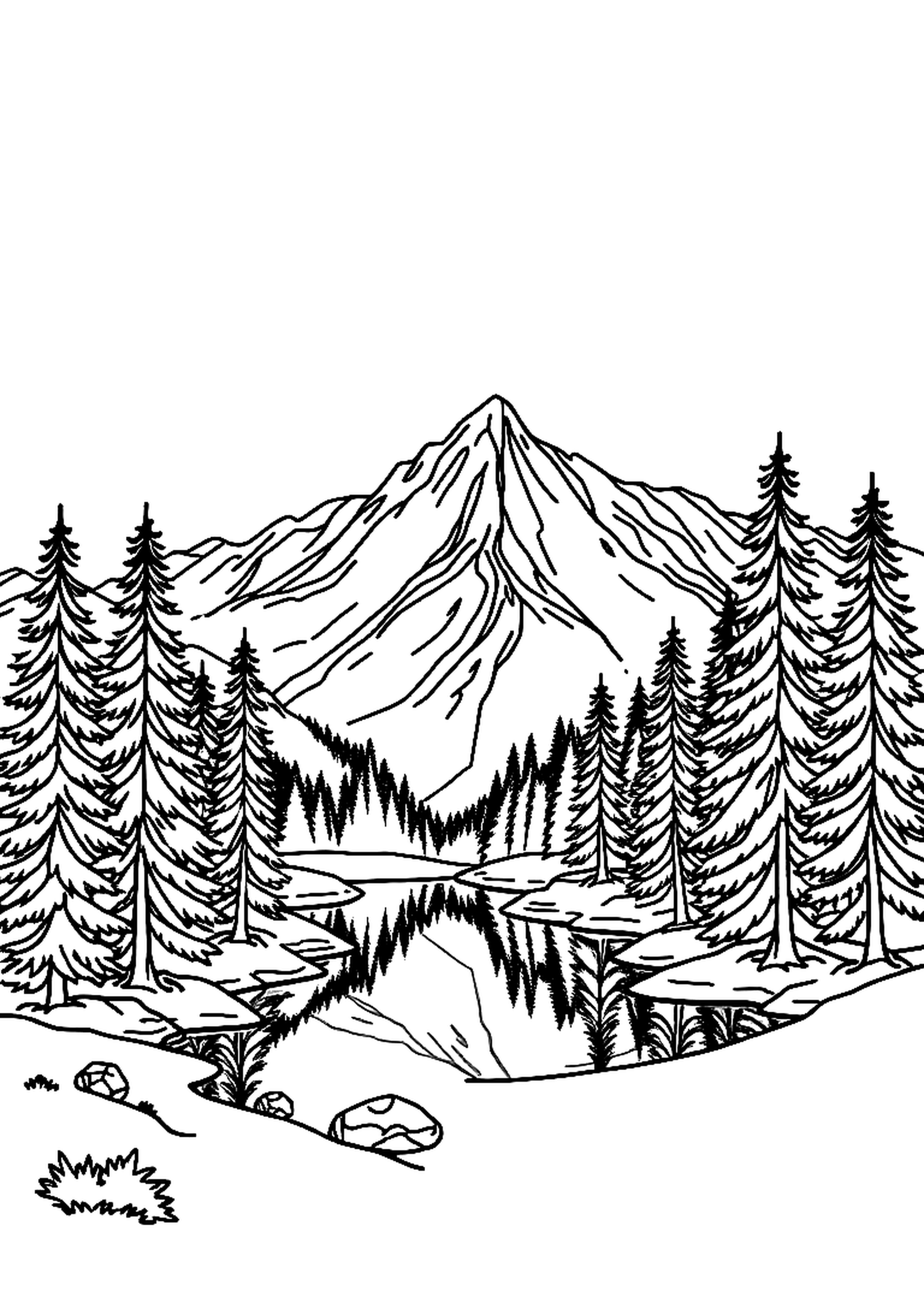 Mountain rising over a calm lake with trees on the shore