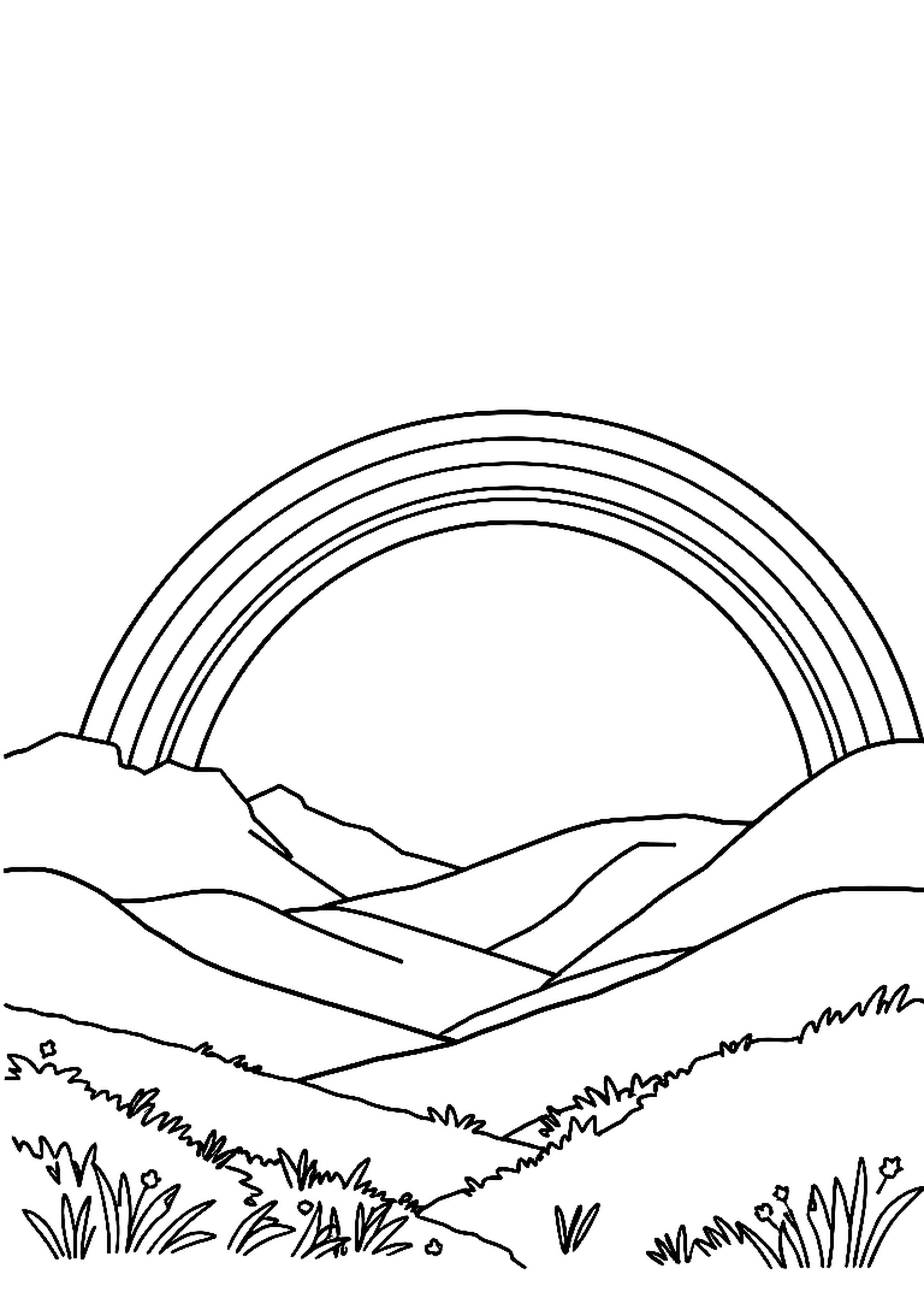 Bright rainbow arching across the sky with fluffy clouds